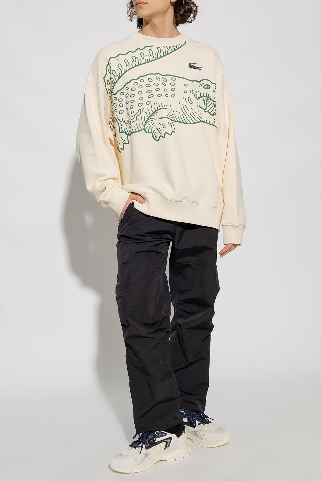 Brushed metal crocodile and embossed Lacoste branding